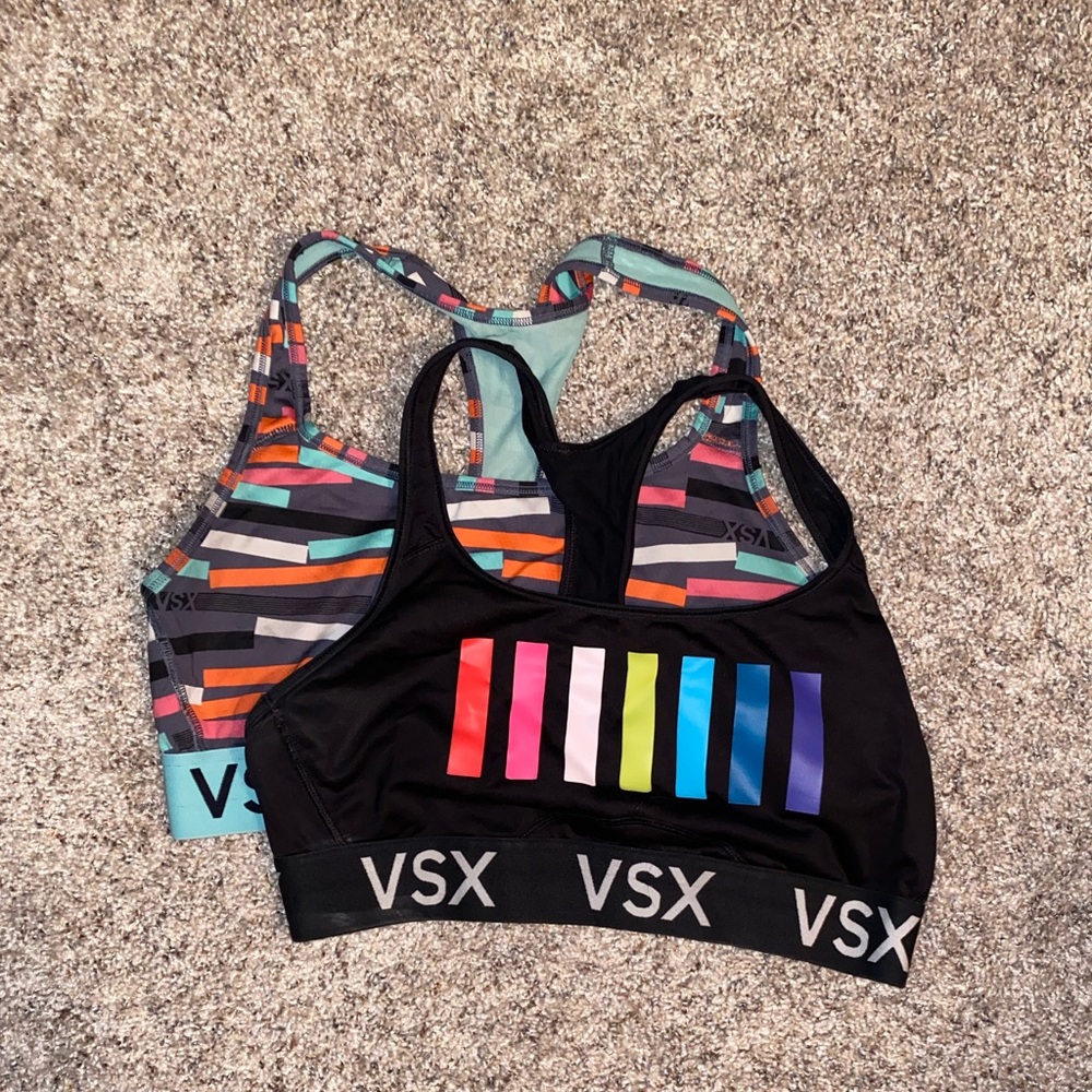 Two large Victoria Secret sports bras